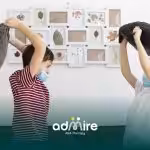 Autistic kids in masks playfully hit pillows indoors, symbolizing emotional overwhelm and varied stress responses.