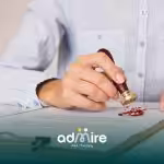 Therapist stamps paperwork on clipboard, symbolizing RBT certification, documentation, and professional credentials.