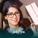 Graduate holding book and wearing cap & gown, symbolizing BCBA certification path & education requirements without a masters
