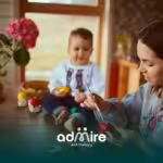 Therapist painting craft with autistic toddler at home, illustrating ABA therapy activities that support stress relief.