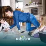 Therapist guides autistic kids through play and activities at home while using a visual schedule to support daily routines.
