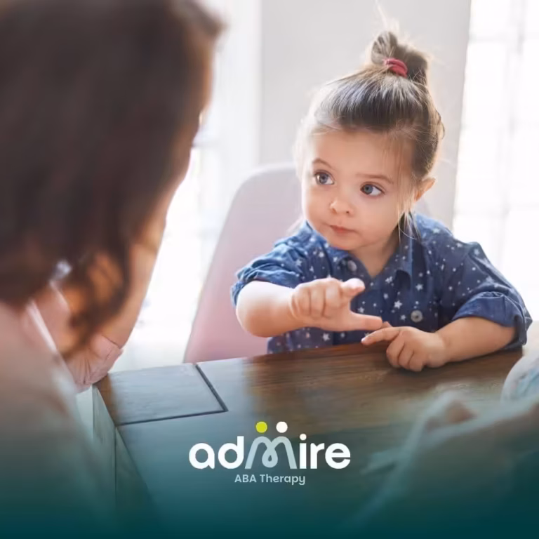 Autistic boy interacts with therapist during playtime, highlighting communication skills and verbal development.