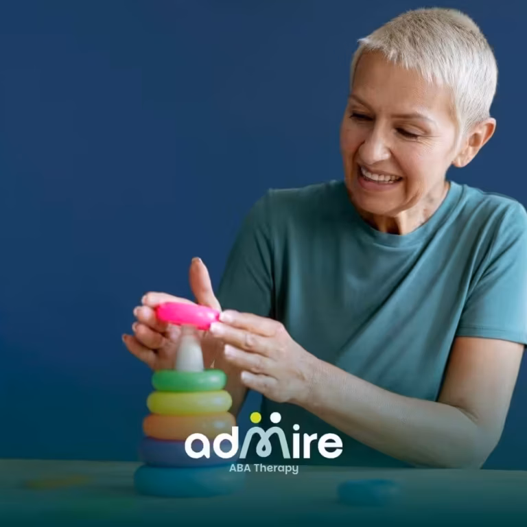 Autistic girl playing with a stacking toy, representing how autism traits can change over time after therapy