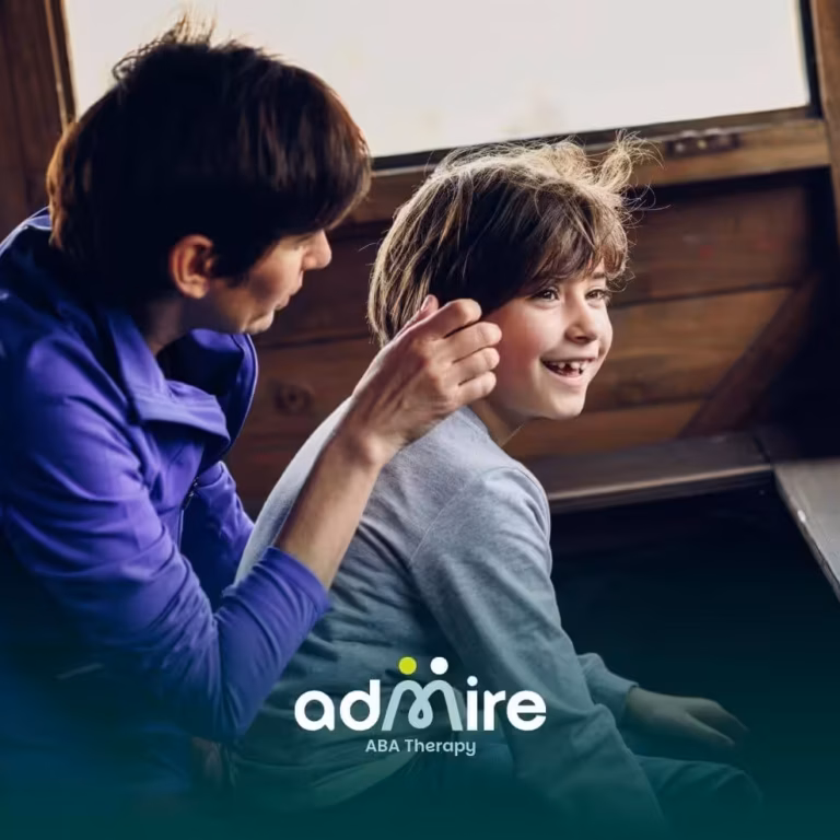 Therapist and autistic child engaging in a communication-focused interaction to build social and listening skills.