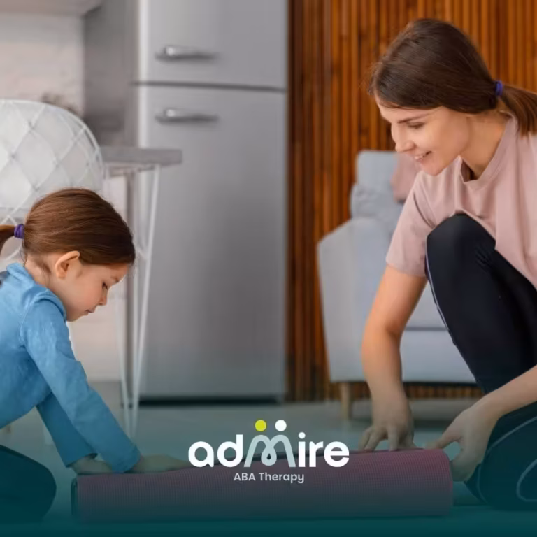 Therapist helping autistic kid roll out exercise mat at home, preparing environment for structured in-home ABA therapy