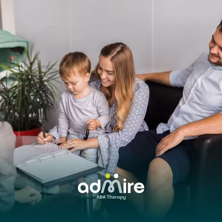 A family of three sitting in an office while a professional helps them with paperwork, creating a calm & welcoming atmosphere