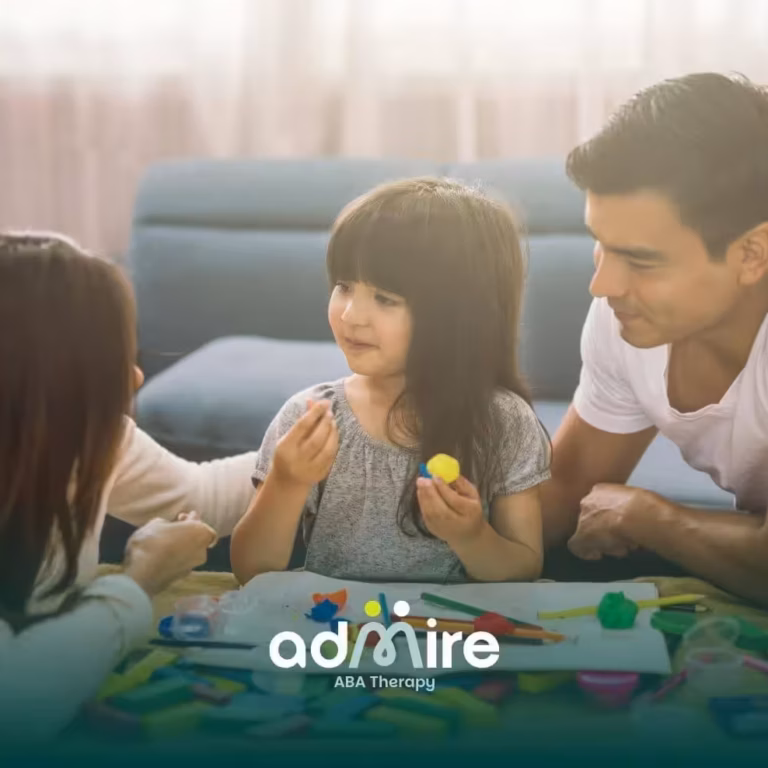 Therapist participate in an in-home ABA therapy activity with autistic child using colorful toys and creative play materials