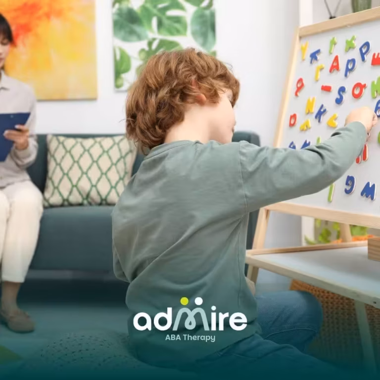 Autistic boy places colorful alphabet letters on a board as therapist encourages communication and cognitive growth.