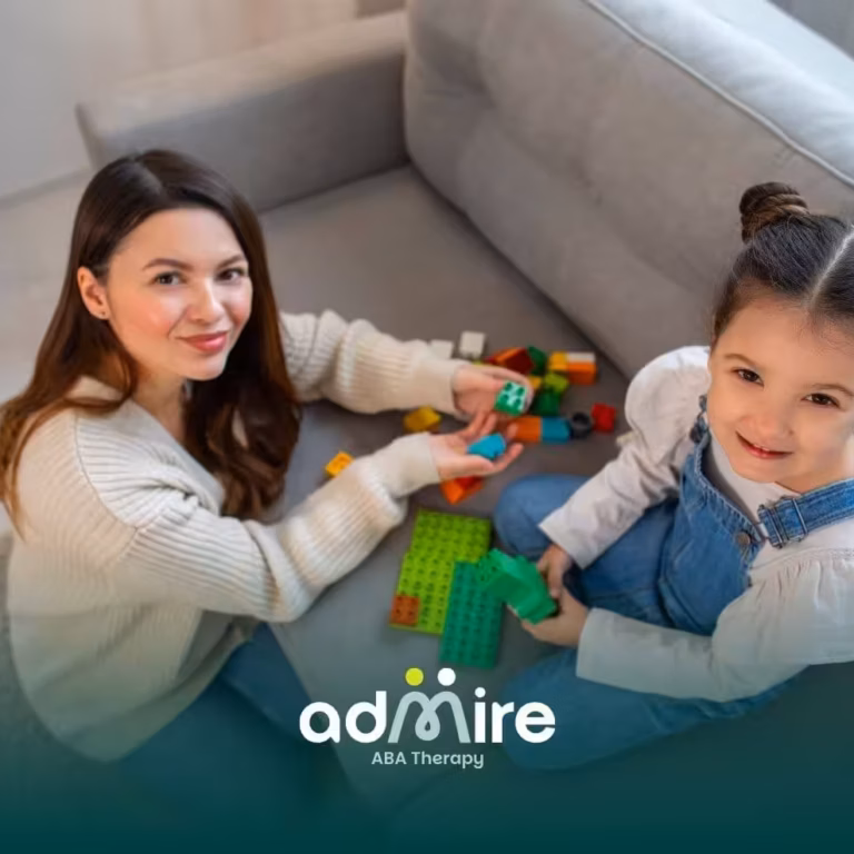 n autistic child playing with a toy while an adult observes, representing sensory behaviors and developmental differences.